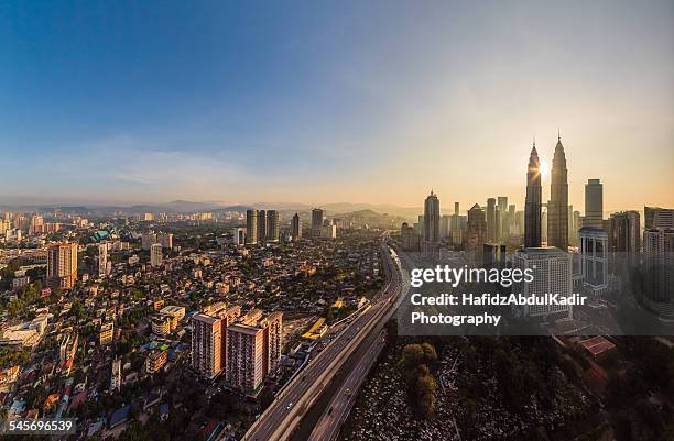 panoramic view of kuala lumpur at sunrise - malaysia city stock pictures, royalty-free photos & images