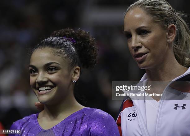 Lauren Hernandez with Maggie Haney after competing on the balance beam during day 1 of the 2016 U.S. Olympic Women's Gymnastics Team Trials at SAP...