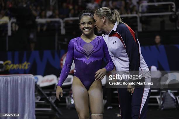 Lauren Hernandez with Maggie Haney after competing on the balance beam during day 1 of the 2016 U.S. Olympic Women's Gymnastics Team Trials at SAP...