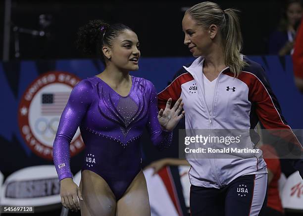 Lauren Hernandez with Maggie Haney after competing on the balance beam during day 1 of the 2016 U.S. Olympic Women's Gymnastics Team Trials at SAP...