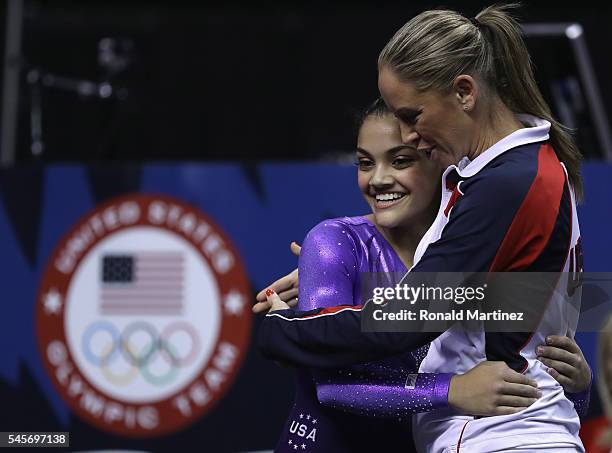 Lauren Hernandez with Maggie Haney after competing on the balance beam during day 1 of the 2016 U.S. Olympic Women's Gymnastics Team Trials at SAP...