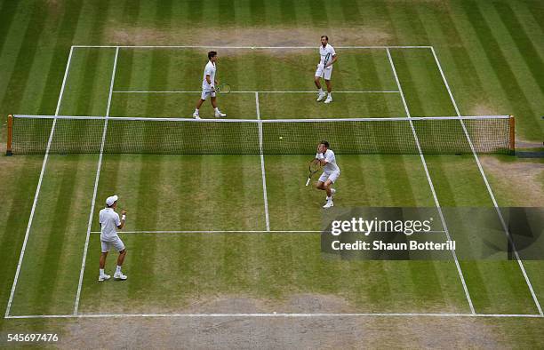 Nicolas Mahut of France and Pierre-Hugues Herbert of France celebrate victory following the Men's Doubles Final against Julien Benneteau of France...