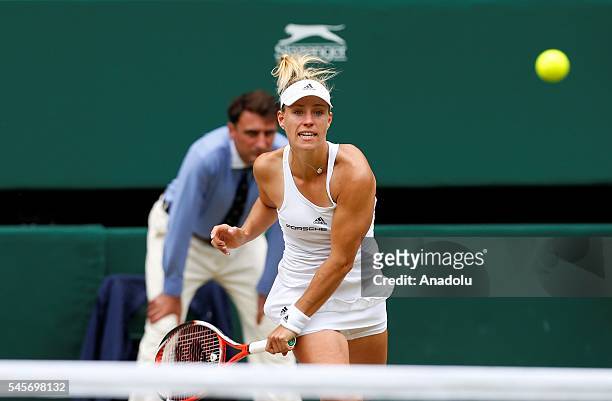 Angelique Kerber of Germany in action against Serena Williams of USA in the women's singles finals match on day twelve of the 2016 Wimbledon...