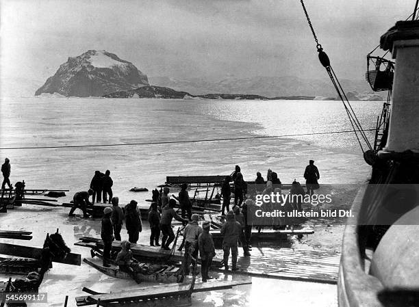 German geophysicist and meteorologist. Wegener's team during their expedition to Greenland. Photograph, November 1930.