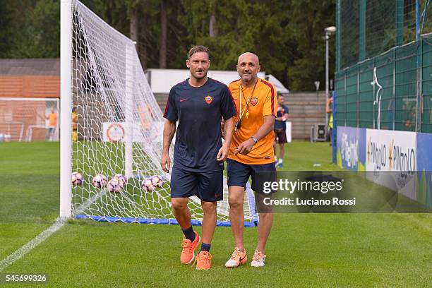 TRoma player Francesco Totti and Coach Luciano Spalletti during an AS Roma training session on July 9, 2016 in Pinzolo near Trento, Italy.