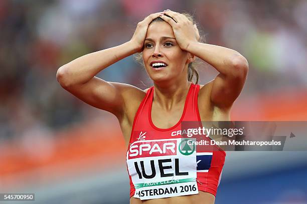 Amalie Hammild Iuel of Norway reacts during the womens 400m hurdles on day four of The 23rd European Athletics Championships at Olympic Stadium on...