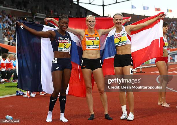 Antoinette Nana Djimou of France, Anouk Vetter of The Netherlands and Ivona Dadic of Austria celebrate winning medals in the womens heptathlon on day...