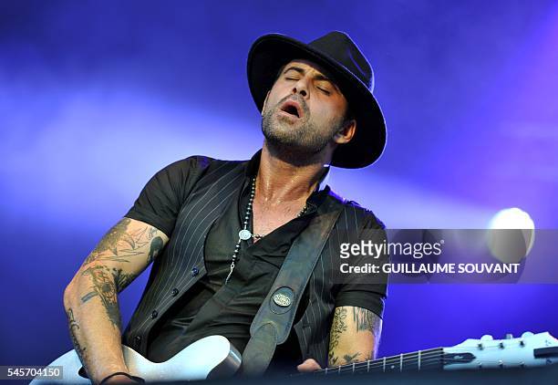 French singer and guitarist Manu Lanvin performs on stage during the 23rd edition of the Cognac Blues Passion festival on July 09, 2016 in Cognac. /...