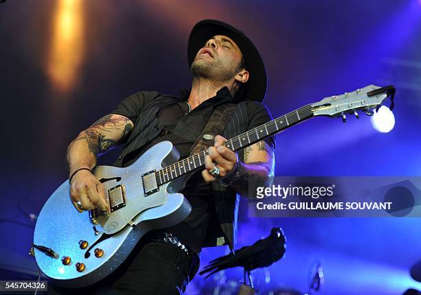 French singer and guitarist Manu Lanvin performs on stage during the 23rd edition of the Cognac Blues Passion festival in Cognac on July 9, 2016. /...