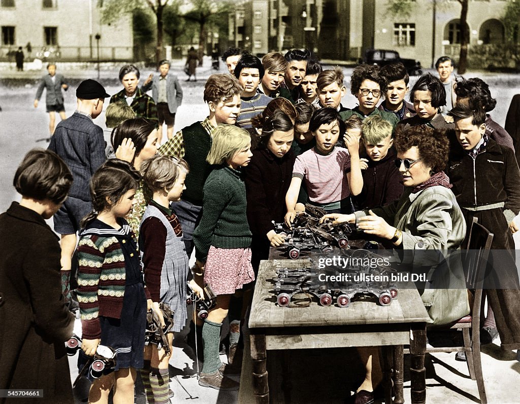 Germany Berlin Reinickendorf - children at a roller-skate rental Digitally colorized. Original: image no 00092109 - 1953