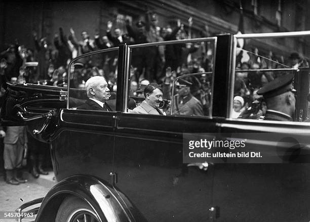The Reichspräsident Paul of Hindenburg and the Reichskanzler Adolf Hitler in the car on the way from the Alte Reichskanzlei to the festivities...