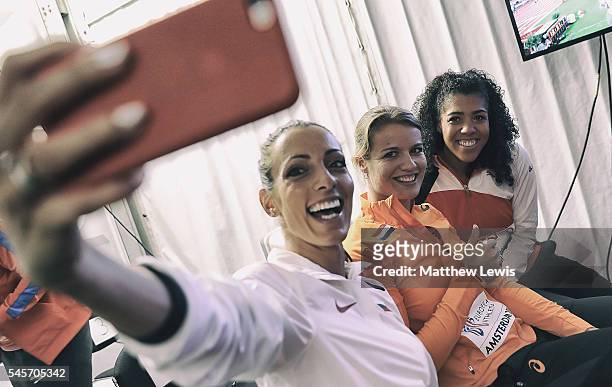 Ivet Lalova-Collio of Bulgaria takes a selfie with Dafne Schippers of the Netherlands and Mujinga Kambundji of Switzerland, as they wait for the...