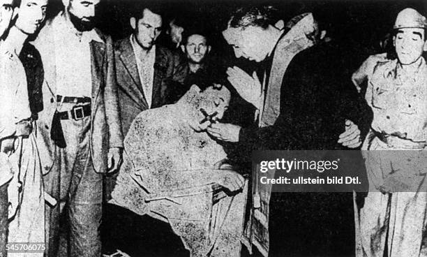 Northern Italy 1945 - Theater of WarUprising in Northern Italy end of April 1945Last rites for a fascist official before his execution by a partisan...