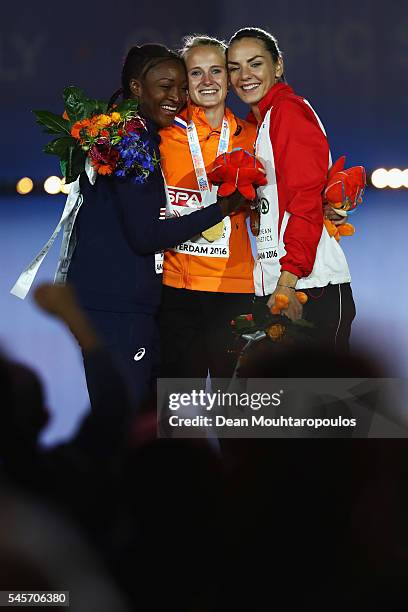 Nana Djimou of France, Anouk Vetter of The Netherlands and Ivona Dadic of Austria on the podium after receiving their medals for the womens...