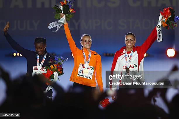 Nana Djimou of France, Anouk Vetter of The Netherlands and Ivona Dadic of Austria on the podium after receiving their medals for the womens...