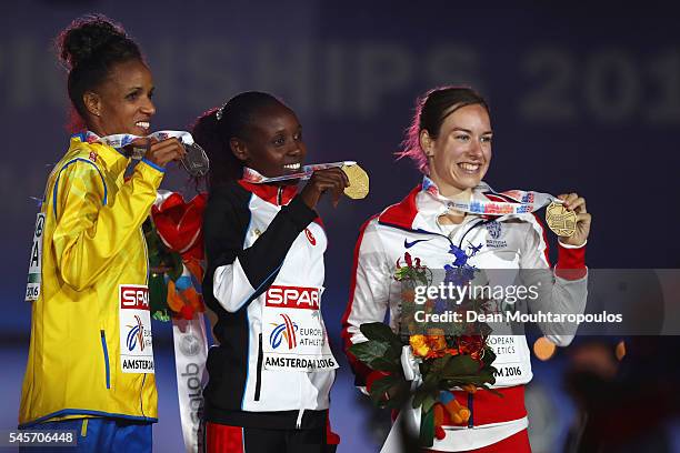 Meraf Bahta of Sweden, Yasemin Can of Turkey and Steph Twell of Hreat Britain on the podium after receiving their medals for the womens 5000m on day...