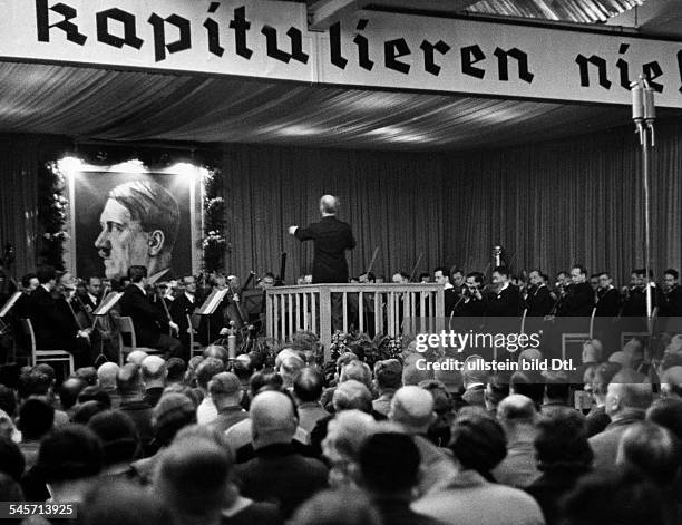 Wilhelm Furtwängler conducting a concert during a recreational break at the engeneering works R. Stock & Co. In Berlin - Marienfelde -