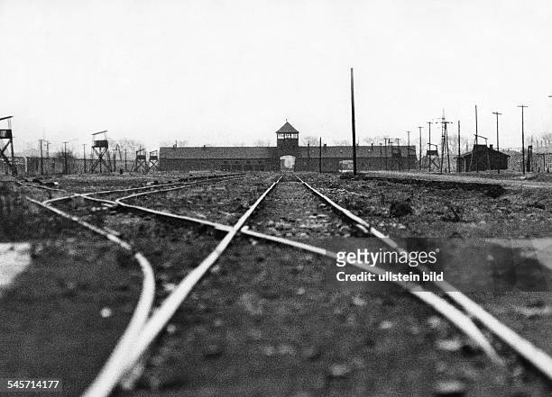 Poland; Auschwitz; former concentration camp; gate with tracks - 1964