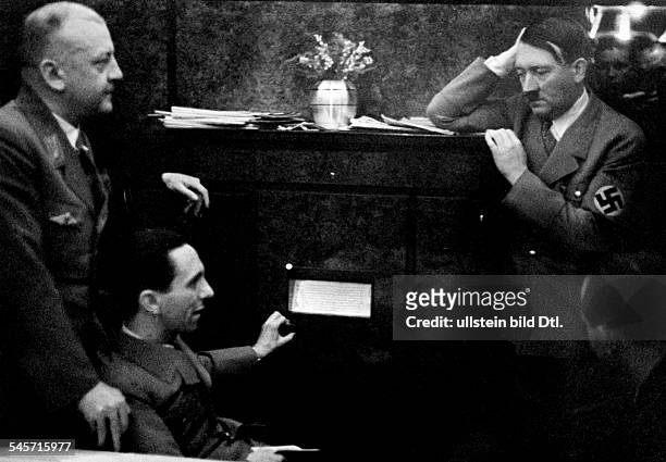 Germany, Adolf Hitler and Jospeh Goebbels at the Berghof listening to the radio on the occasion of the plesbicite on the re-union of the Saarland...
