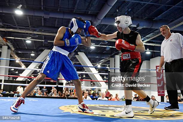 Young boxers compete during a tournament at the UFC Fan Expo at the Las Vegas Convention Center on July 9, 2016 in Las Vegas, Nevada.