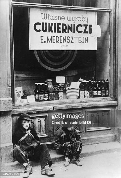 World War II, Warsaw Ghetto during the German occupation: from a Nazi propaganda series 'Jews among themselves', starving children in front of a...