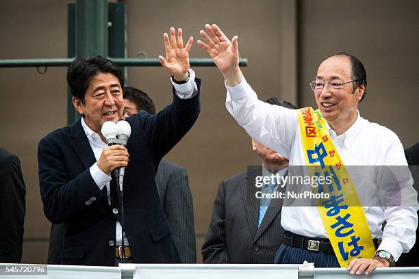 Japanese Prime Minister Shinzo Abe, president of the ruling Liberal Democratic Party , delivers a campaign speech to support candidate Masaharu...