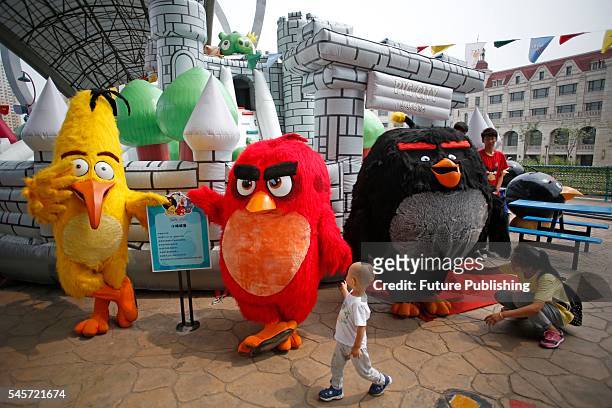People tour in a Angry Birds theme park during its first opening on July 9, 2016 in Tianjin, China. It is the first one authorized by the Finnish...