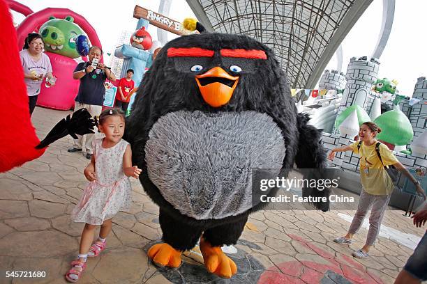 People tour in a Angry Birds theme park during its first opening on July 9, 2016 in Tianjin, China. It is the first one authorized by the Finnish...