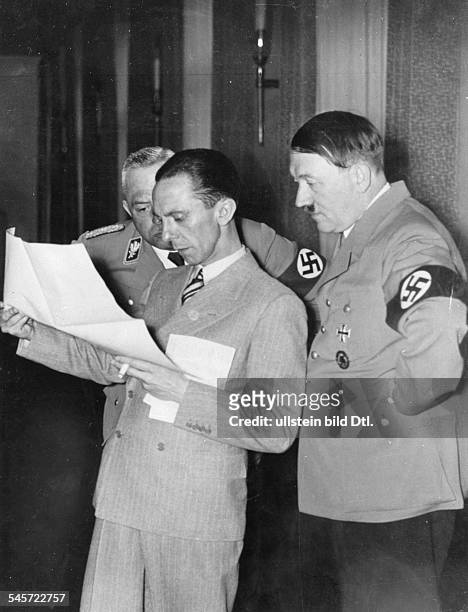 Reelection of the Reichstag after the military occupation of the Rhineland region; Adolf Hitler, Joseph Goebbels and the Reichminister of church...