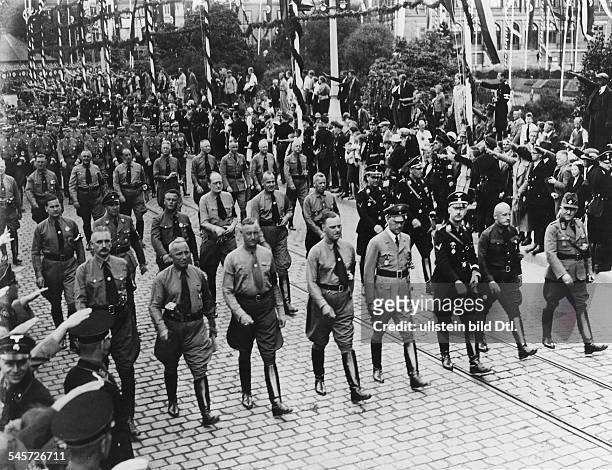 Germany Third Reich Party Congress in Weimar: Nazi leaders marching through the streets of the city; front row from left: Minister Bernhard Rust,...