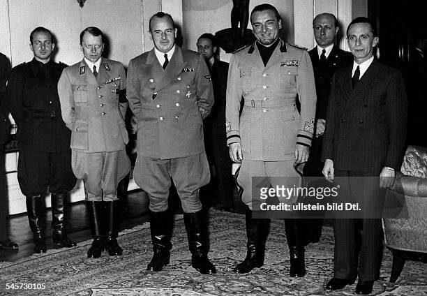 Empfang für den italienischenJustizminister Graf Dino Grandi durch Joseph Goebbels; linksneben Grandi: Reichsminister Dr. HansFrank , Präsident...