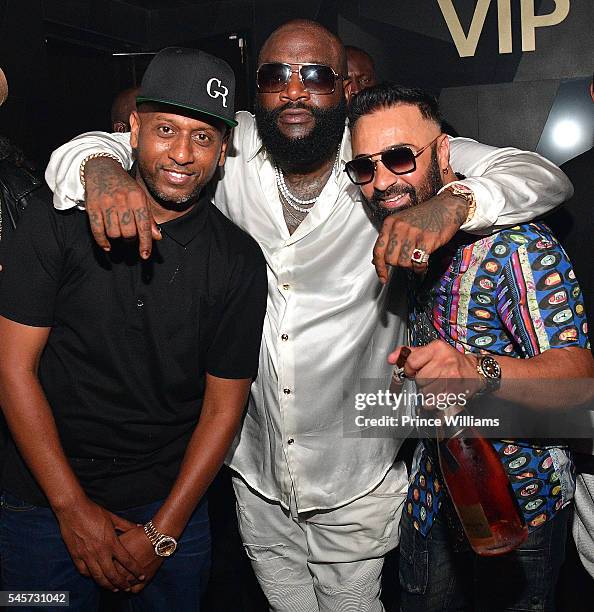 Alex Gidewon and Rick Ross attend a Party at Gold Room on July 4, 2016 in Atlanta, Georgia.