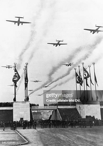 Germany, Third Reich - Nuremberg Rally 1938 Aircrafts of the 'Luftwaffe' are flying over the rally ground on 'Defense Force Day'