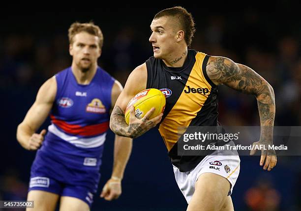 Dustin Martin of the Tigers in action during the 2016 AFL Round 16 match between the Western Bulldogs and the Richmond Tigers at Etihad Stadium on...