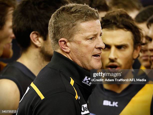 Damien Hardwick, Senior Coach of the Tigers addresses his players during the 2016 AFL Round 16 match between the Western Bulldogs and the Richmond...