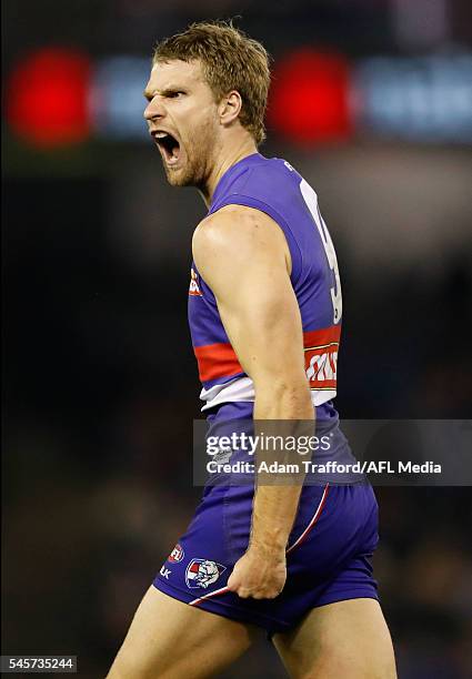 Jake Stringer of the Bulldogs celebrates a goal during the 2016 AFL Round 16 match between the Western Bulldogs and the Richmond Tigers at Etihad...