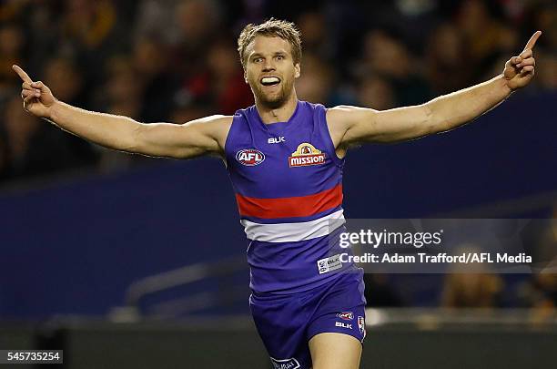 Jake Stringer of the Bulldogs celebrates a goal during the 2016 AFL Round 16 match between the Western Bulldogs and the Richmond Tigers at Etihad...