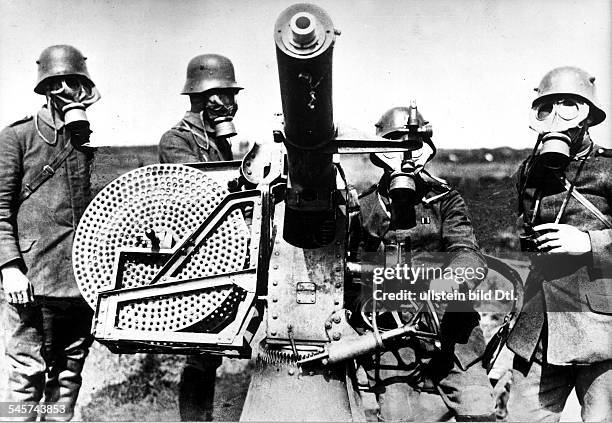 German soldiers with gas masks with a 3.7 cm anti-aircraft gun on the Western Front- no further details