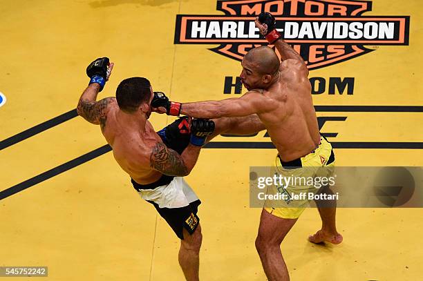 Frankie Edgar kicks Jose Aldo of Brazil during the UFC 200 event on July 9, 2016 at T-Mobile Arena in Las Vegas, Nevada.