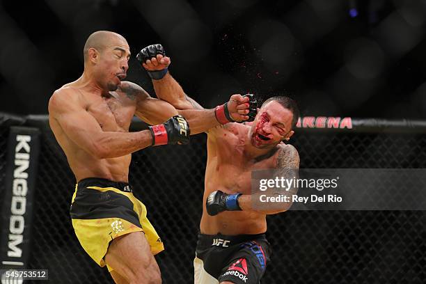 Jose Aldo punches Frankie Edgar during the UFC 200 event at T-Mobile Arena on July 9, 2016 in Las Vegas, Nevada.