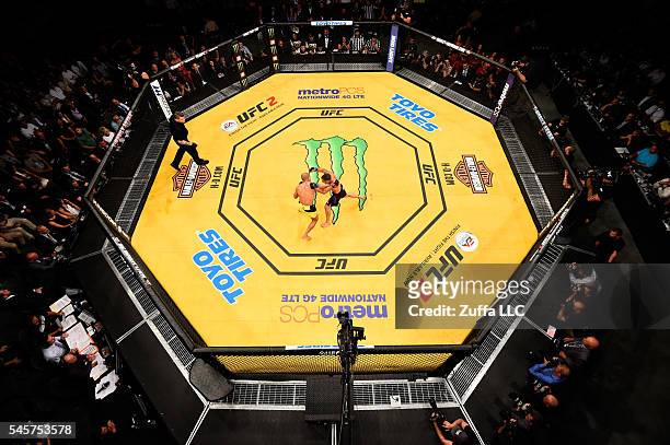 An overhead view of the Octagon as Jose Aldo of Brazil punches Frankie Edgar during the UFC 200 event on July 9, 2016 at T-Mobile Arena in Las Vegas,...