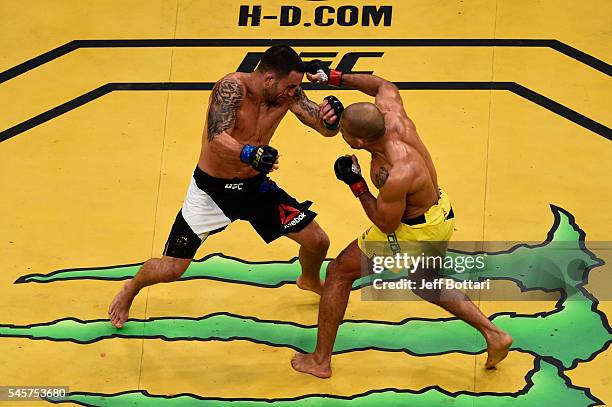 Jose Aldo of Brazil punches Frankie Edgar during the UFC 200 event on July 9, 2016 at T-Mobile Arena in Las Vegas, Nevada.