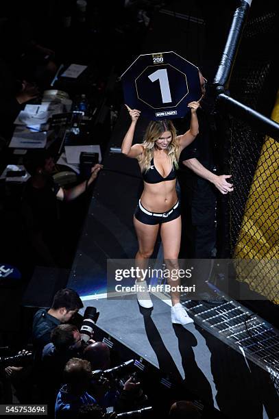 An overhead view of the Octagon as Octagon Girl Chrissy Blair introduces round one of Aldo vs Edgar during the UFC 200 event on July 9, 2016 at...