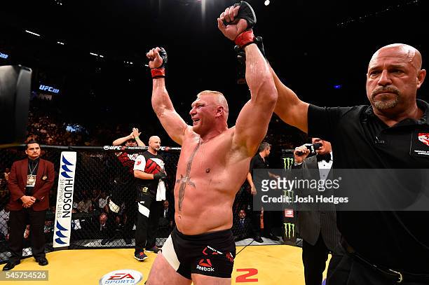 Brock Lesnar reacts to his victory over Mark Hunt of New Zealand in their heavyweight bout during the UFC 200 event on July 9, 2016 at T-Mobile Arena...