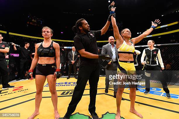 Amanda Nunes of Brazil reacts to her victory over Miesha Tate in their UFC women's bantamweight championship bout during the UFC 200 event on July 9,...