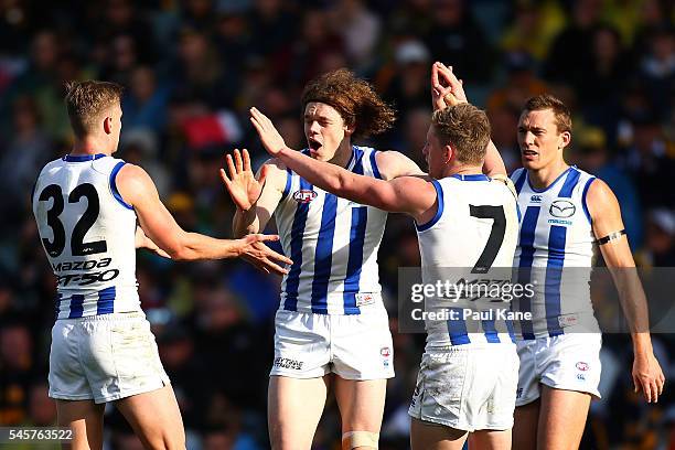 Ben Brown of the Kangaroos celebrates a goal during the round 16 AFL match between the West Coast Eagles and the North Melbourne Kangaroos at Domain...