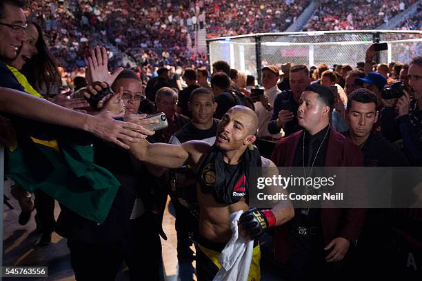 Jose Aldo celebrates after defeating Frankie Edgar during UFC 200 at T-Mobile Arena on July 9, 2016 in Las Vegas, Nevada.