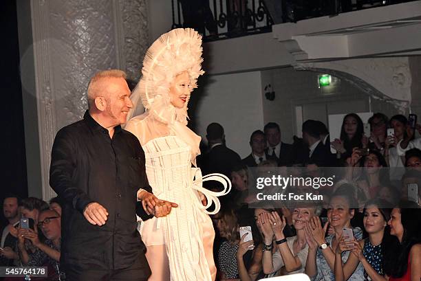 Jean Paul Gaultier and a model walk the runway during the Jean-Paul Gaultier Haute Couture Fall/Winter 2016-2017 show as part of Paris Fashion Week...