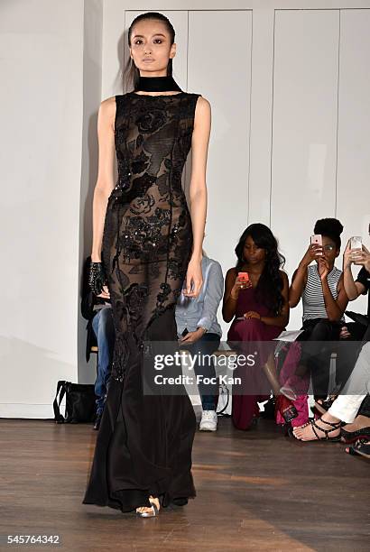 Model walks the runway during the Dany Atrache Haute Couture Fall/Winter 2016-2017 show as part of Paris Fashion Week on July 4, 2016 in Paris,...