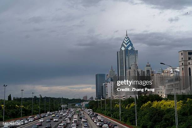 Traffic and buildings in downtown Urumqi. Traffic and buildings in downtown Urumqi. Xinjiang's economy grew at 2.5 percentage points above the...